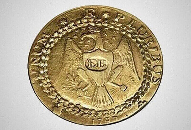 золотая монетка 1 $
